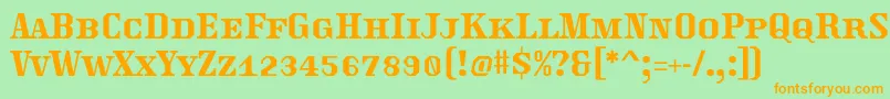 Traktoretka Font – Orange Fonts on Green Background