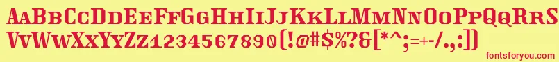 Traktoretka Font – Red Fonts on Yellow Background