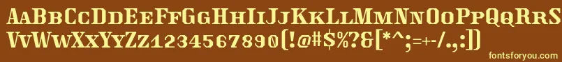 Traktoretka Font – Yellow Fonts on Brown Background