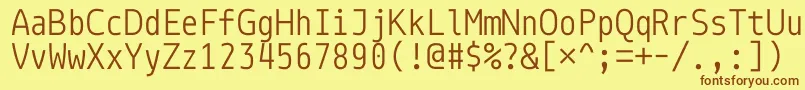 フォントMonoidA0A1A3AlAdAa – 茶色の文字が黄色の背景にあります。