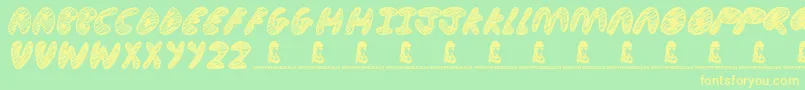 UltimateChaos Font – Yellow Fonts on Green Background