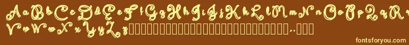 Domywriting-fontti – keltaiset fontit ruskealla taustalla