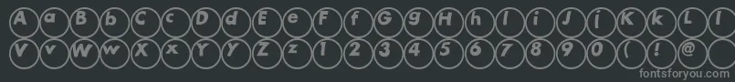 Saiba mais sobre a fonte Ball Fonte Ball – fontes cinzas em um fundo preto