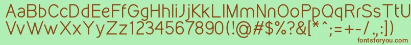 フォントKirvyRegular – 緑の背景に茶色のフォント