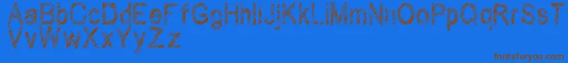 Wilhomena Font – Brown Fonts on Blue Background