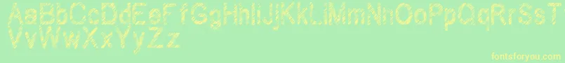 Wilhomena-Schriftart – Gelbe Schriften auf grünem Hintergrund