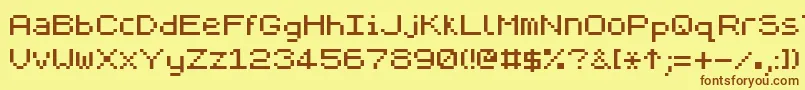 フォントZxpix ffy – 茶色の文字が黄色の背景にあります。