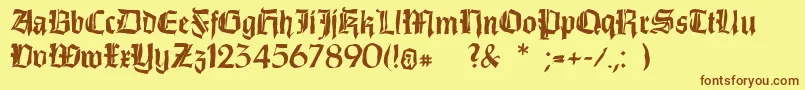 フォントDirtythinkwitz – 茶色の文字が黄色の背景にあります。