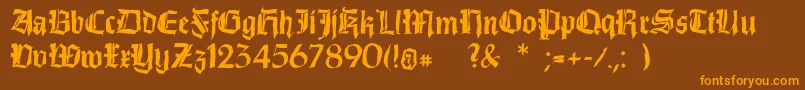 フォントDirtythinkwitz – オレンジ色の文字が茶色の背景にあります。