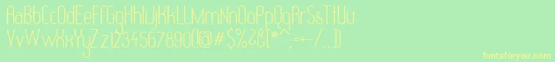RedheadGoddess-Schriftart – Gelbe Schriften auf grünem Hintergrund