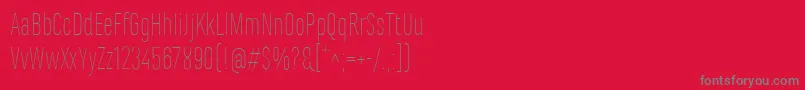 MarianinaCnFyThin-Schriftart – Graue Schriften auf rotem Hintergrund