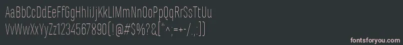 Czcionka MarianinaCnFyThin – różowe czcionki na czarnym tle