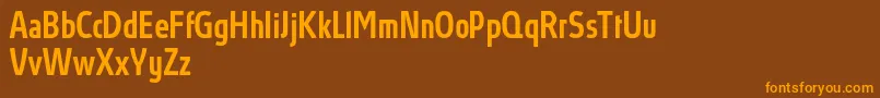 Fonte AbsolutProMediumcondensed – fontes laranjas em um fundo marrom