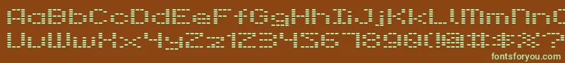 フォントDot – 緑色の文字が茶色の背景にあります。