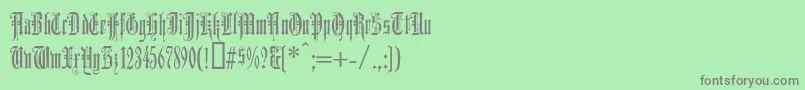 フォントDuerergotisch – 緑の背景に灰色の文字