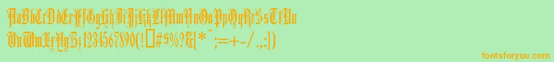 フォントDuerergotisch – オレンジの文字が緑の背景にあります。