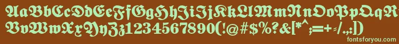 フォントFettenationalfraktur – 緑色の文字が茶色の背景にあります。