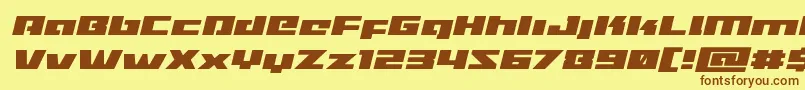 Шрифт Turbochargeexpandital – коричневые шрифты на жёлтом фоне