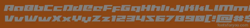Шрифт Turbochargeexpandital – серые шрифты на коричневом фоне