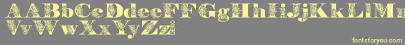 FloryannaDemo Font – Yellow Fonts on Gray Background