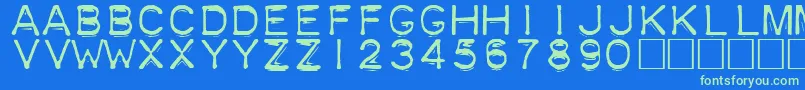 Plastique Font – Green Fonts on Blue Background