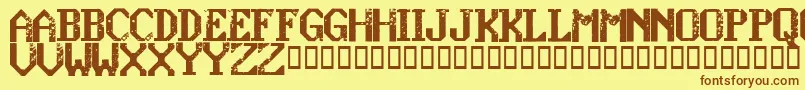 KonquerRegular-Schriftart – Braune Schriften auf gelbem Hintergrund