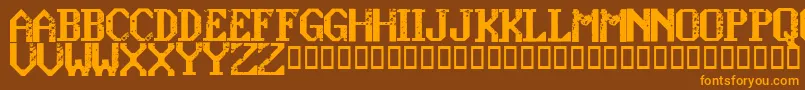フォントKonquerRegular – オレンジ色の文字が茶色の背景にあります。