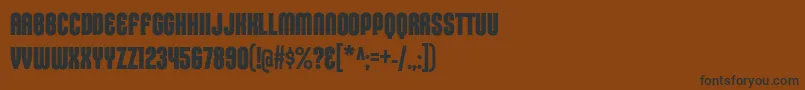 KleptocracyTitlingCdBd-fontti – mustat fontit ruskealla taustalla