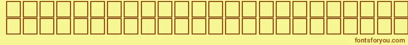 フォントAlKharashi2 – 茶色の文字が黄色の背景にあります。