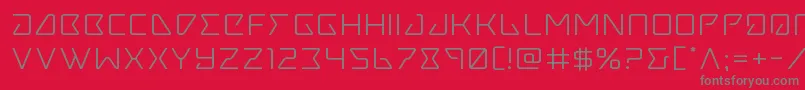 フォントTracerexpand – 赤い背景に灰色の文字