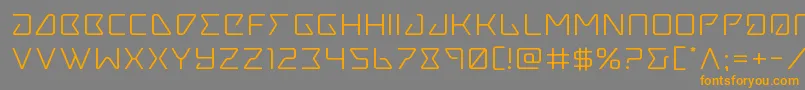 フォントTracerexpand – オレンジの文字は灰色の背景にあります。