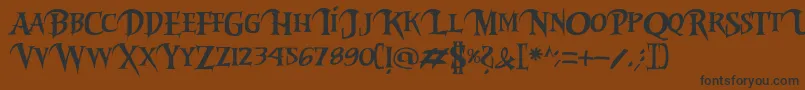 Riky2vamp-fontti – mustat fontit ruskealla taustalla