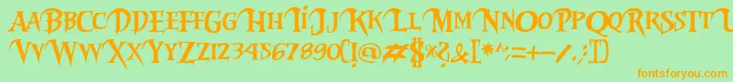 フォントRiky2vamp – オレンジの文字が緑の背景にあります。