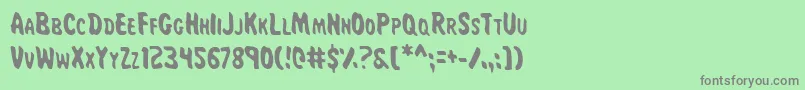 MissAmandaJonesCond-Schriftart – Graue Schriften auf grünem Hintergrund
