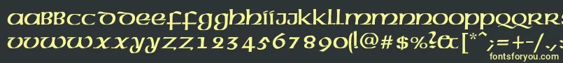 フォントAmericanAmericNormal – 黒い背景に黄色の文字