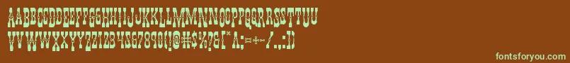 フォントYoungerbrosdropcaps – 緑色の文字が茶色の背景にあります。