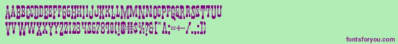 Youngerbrosdropcaps-Schriftart – Violette Schriften auf grünem Hintergrund