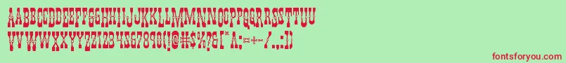Youngerbrosdropcaps-Schriftart – Rote Schriften auf grünem Hintergrund