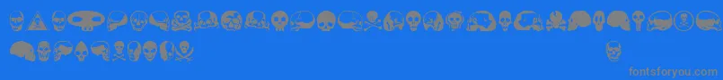 Czcionka Skullbeaaoe – szare czcionki na niebieskim tle