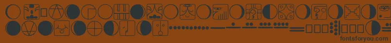 Tzolkin Font – Black Fonts on Brown Background