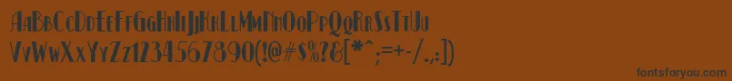 Kismet ffy Font – Black Fonts on Brown Background
