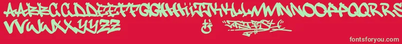 Justfist Font – Green Fonts on Red Background