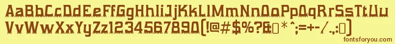 フォントGumtuckeyRegular – 茶色の文字が黄色の背景にあります。