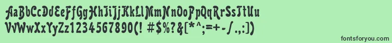 フォントKarollac – 緑の背景に黒い文字