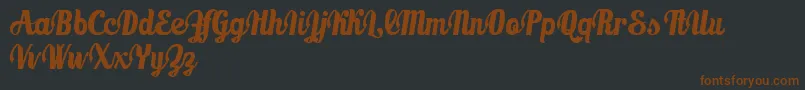 MarmellatajamDemo Font – Brown Fonts on Black Background