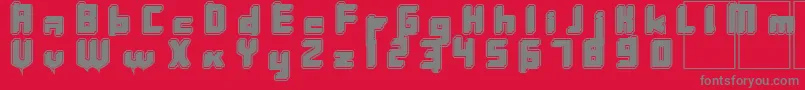 フォントInavelkromosomkalas – 赤い背景に灰色の文字