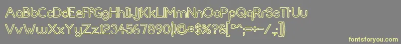 FortunecityOutline Font – Yellow Fonts on Gray Background