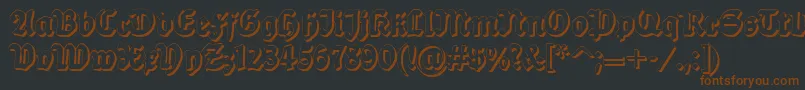 Шрифт Dsballadeshadow – коричневые шрифты на чёрном фоне