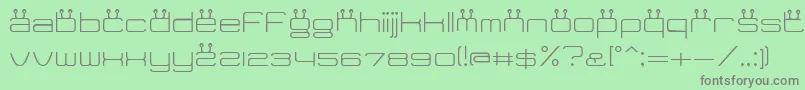 TidyCurveTv Font – Gray Fonts on Green Background