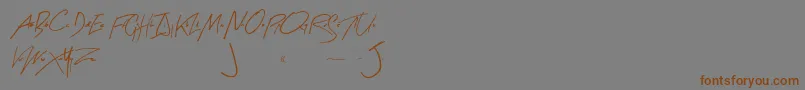 Fonte ArtySignature – fontes marrons em um fundo cinza